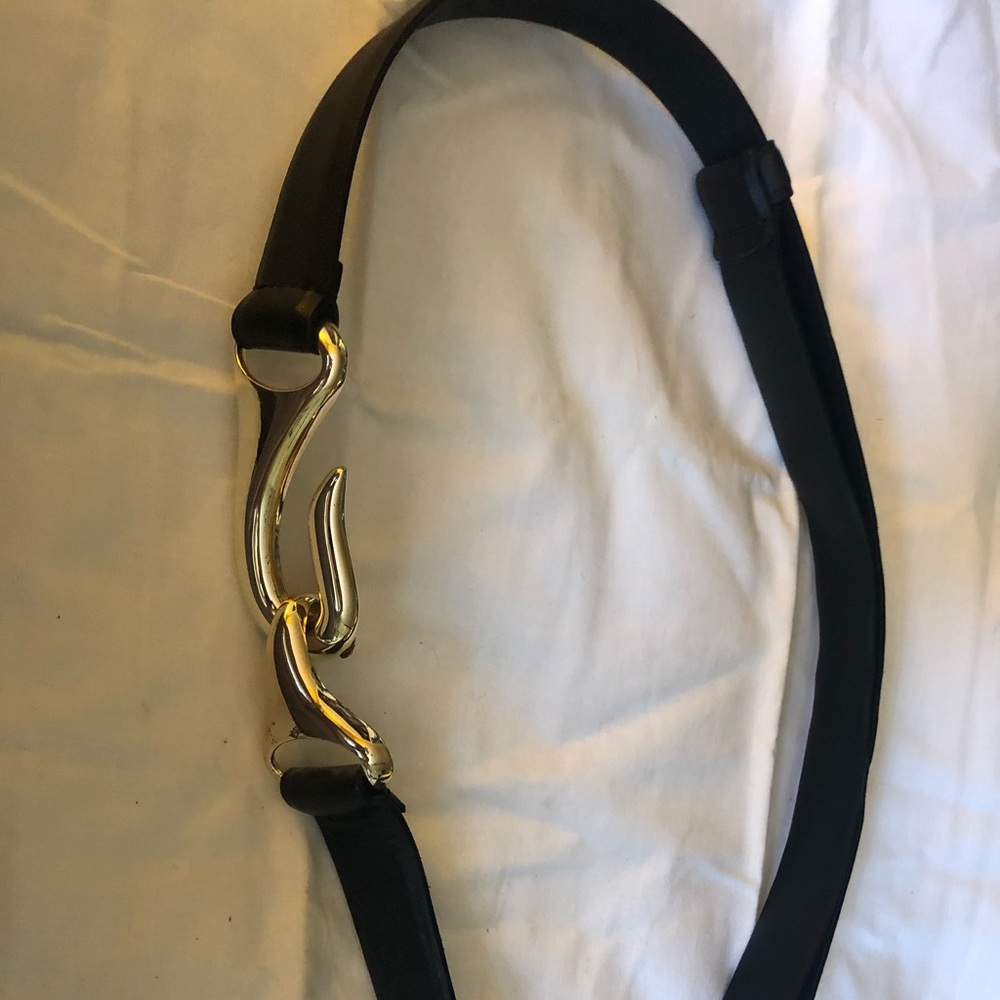Black and gold colored adjustable Belt